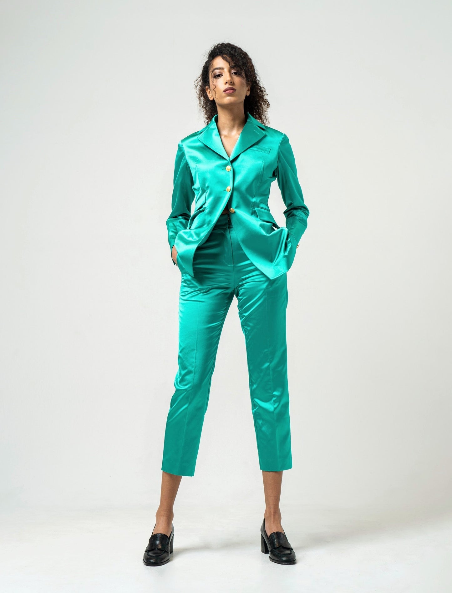 Emerald satin tapered trousers