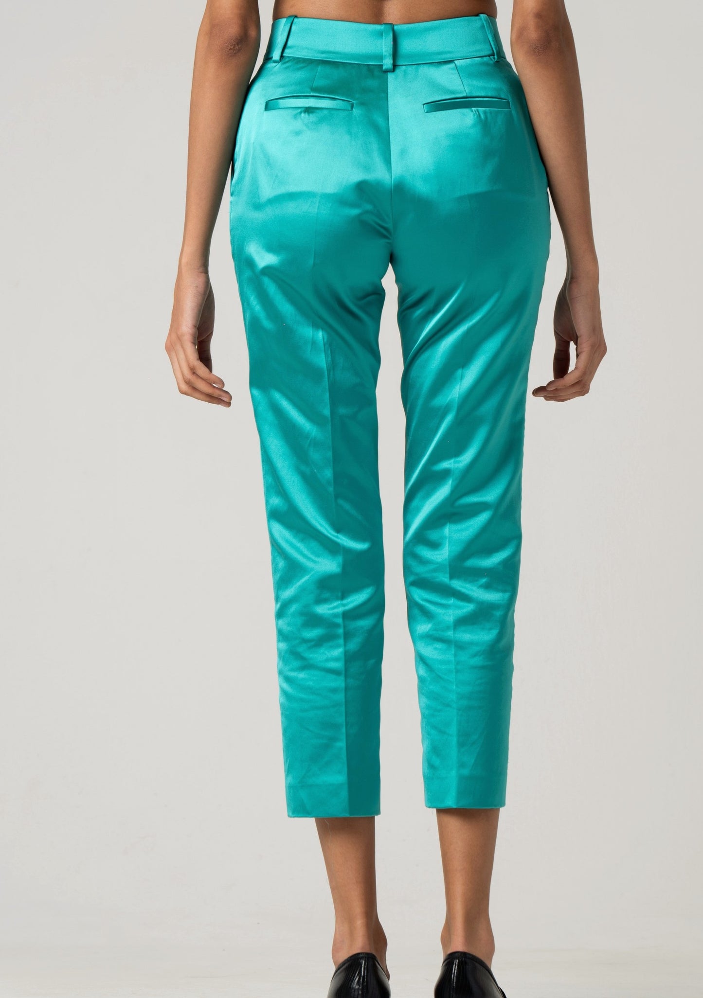 Emerald satin tapered trousers